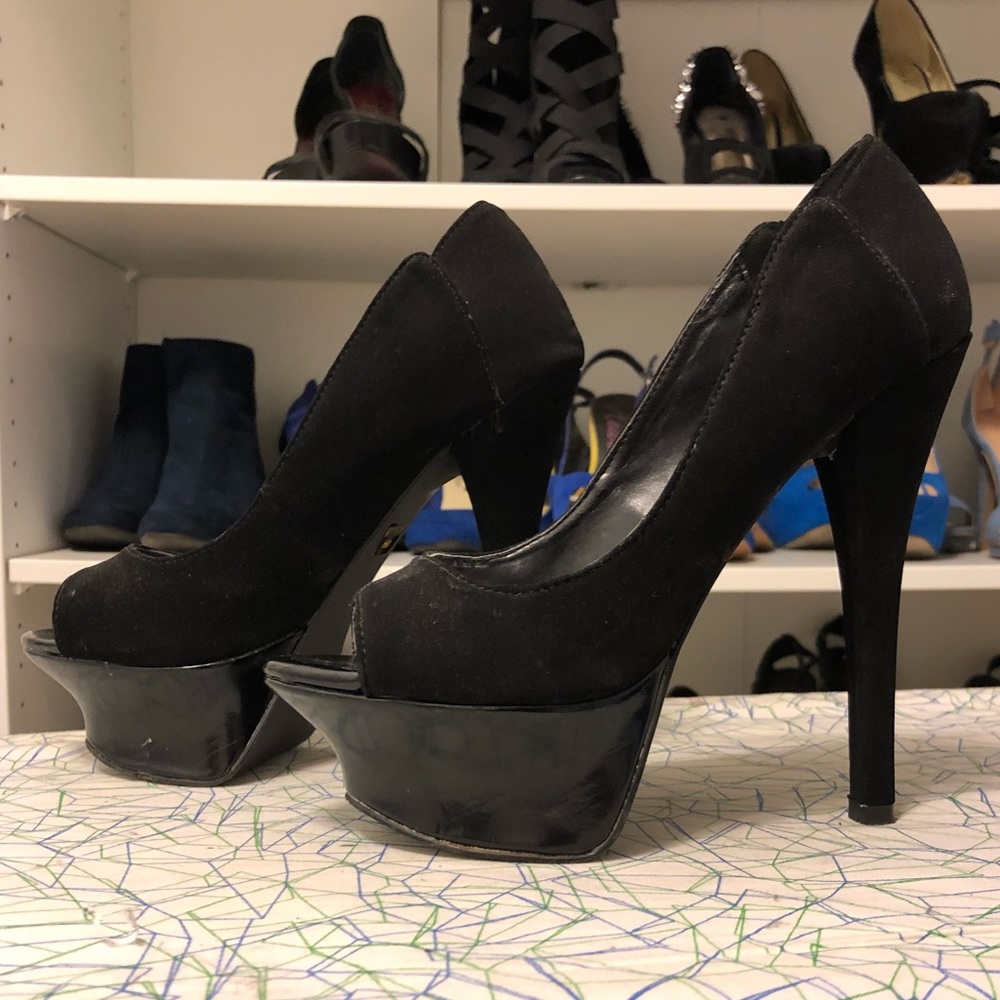 Black platform pumps